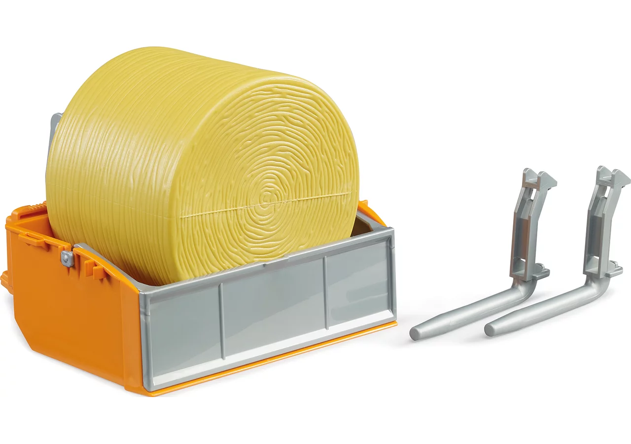 Bruder Hecklade mit Rundballen im Maßstab 1:16
